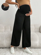 سراويل جينز سوداء فضفاضة للحوامل بنمط لاصق على الوسط - Pink&blue