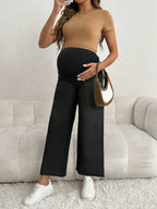 سراويل جينز سوداء فضفاضة للحوامل بنمط لاصق على الوسط - Pink&blue